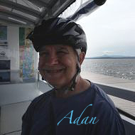 Artist self portrait - photo of Felipe Adan Lerma on converted railway track bike ferry for the Island Line Trail connecting mainland Vermont to South Hero on Lake Champlain.
